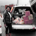 Giving out Sanitary towels to young girls