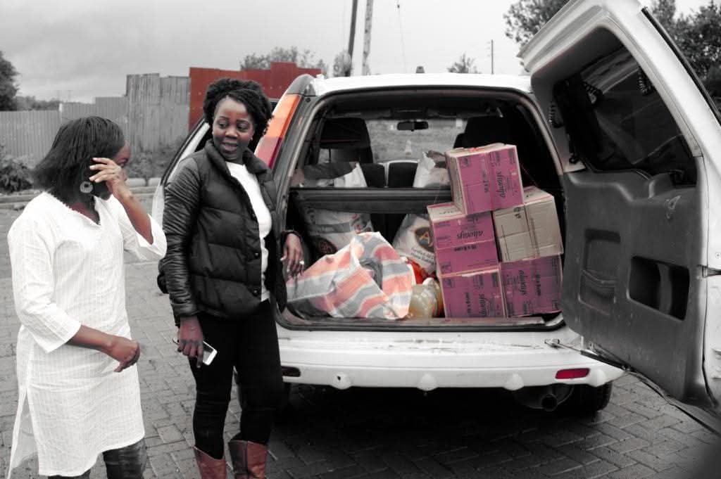 Giving out Sanitary towels to young girls